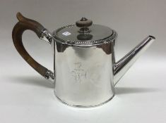 A rare Georgian silver drum teapot with beaded bor