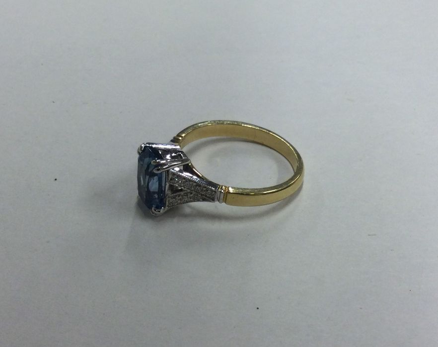 A good aquamarine and diamond crossover ring of st - Image 2 of 3