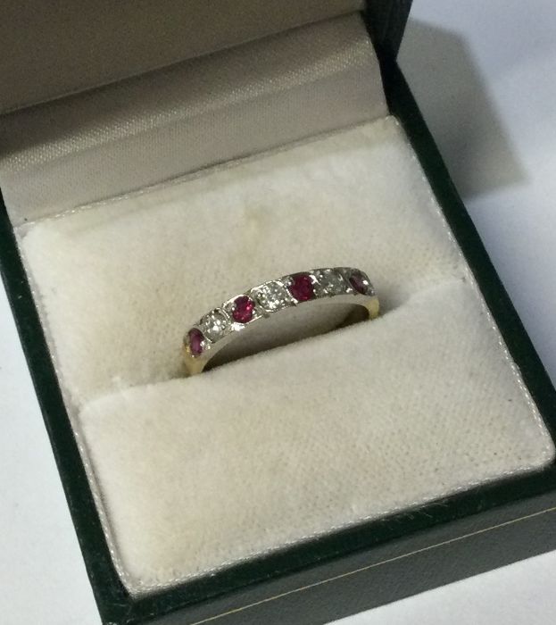 A ruby and diamond seven stone ring in 18 carat go - Image 2 of 3