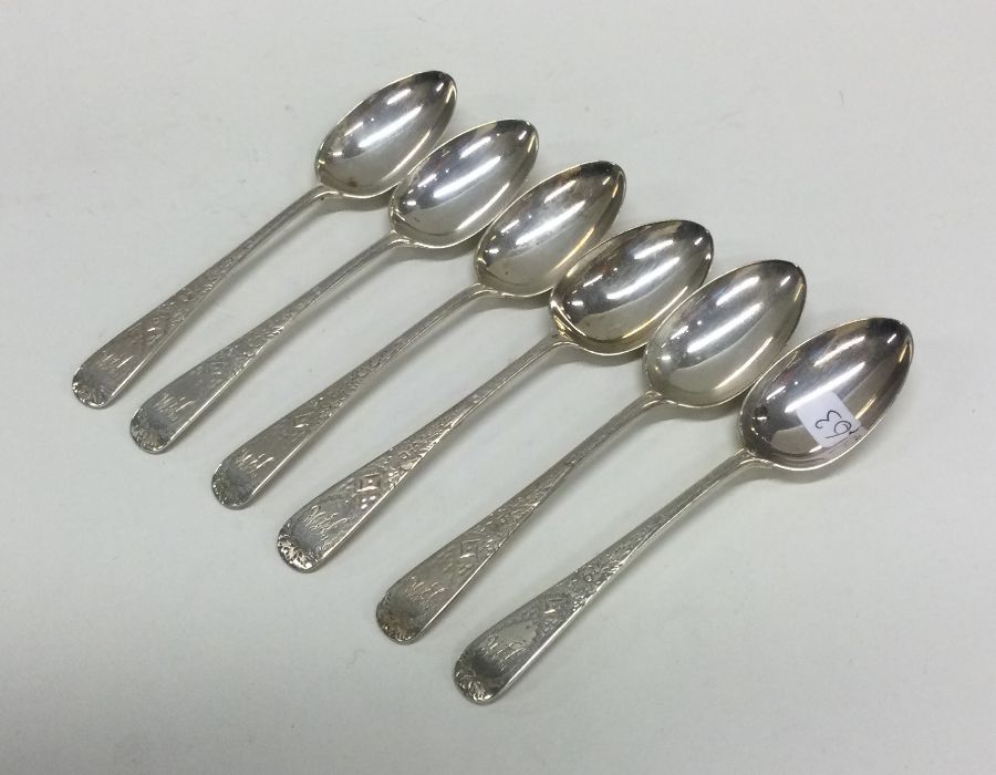 A heavy set of six bright cut silver spoons with e
