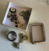 A silver mounted brooch etc. Est. £10 - £20.