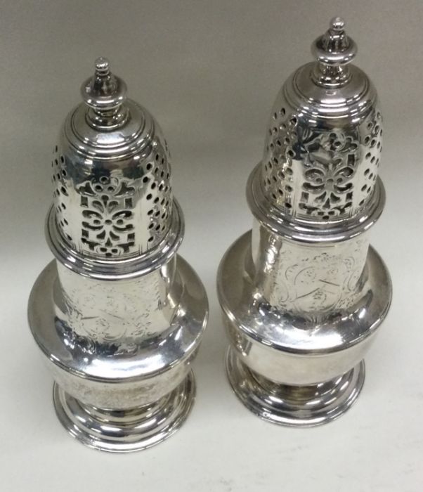 A good pair of George II crested silver casters wi - Image 2 of 3