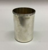 A large heavy plain silver goblet with reeded rim