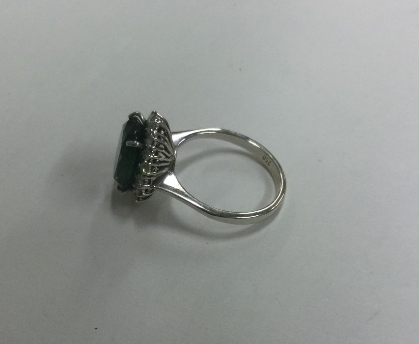 An attractive oval green stone and diamond cluster - Image 2 of 3