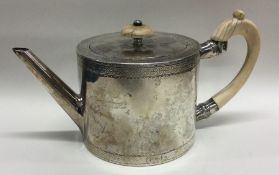 A good Georgian ivory handled drum silver teapot.