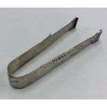 A pair of Continental tapering silver ice tongs. A