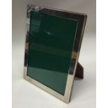 A silver rectangular picture frame of plain form.