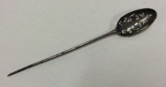 A small Georgian pierced silver mote spoon with sc