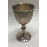 A fine quality Edwardian silver goblet profusely d