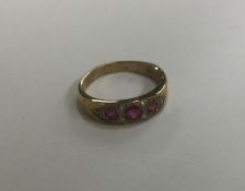 An attractive Victorian style ruby and diamond nin