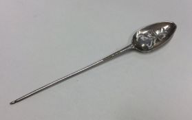 A good Georgian silver mote spoon with pierced bow