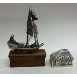 A Continental silver model of a boat together with