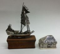 A Continental silver model of a boat together with