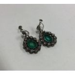 A good pair of Antique emerald and diamond tear sh