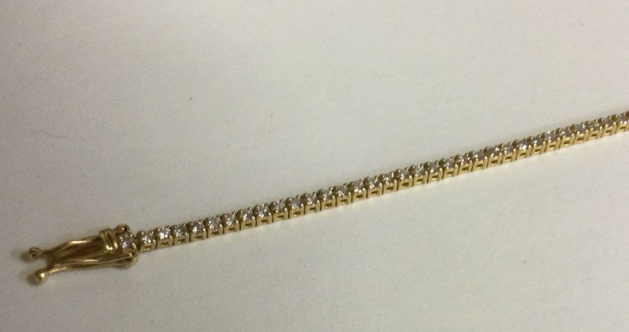 A heavy lady's 18 carat diamond line bracelet with - Image 2 of 2