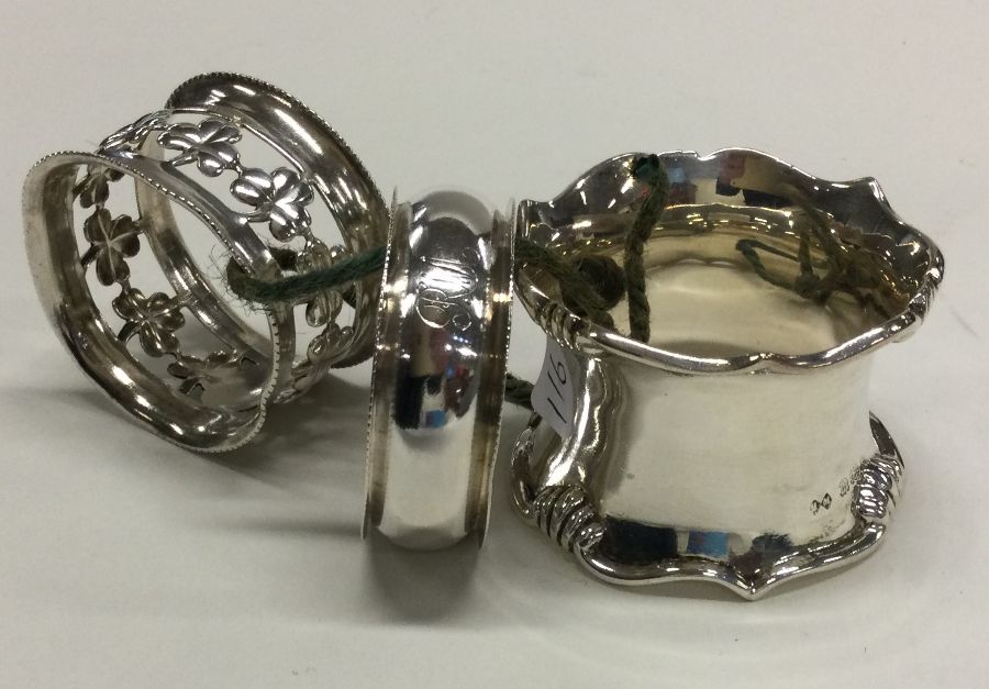 A group of three silver napkin rings. Approx. 66 g