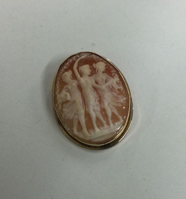 An oval 9 carat cameo of 'The Three Graces'. Appro