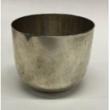 A heavy silver tumbler cup of typical form. London
