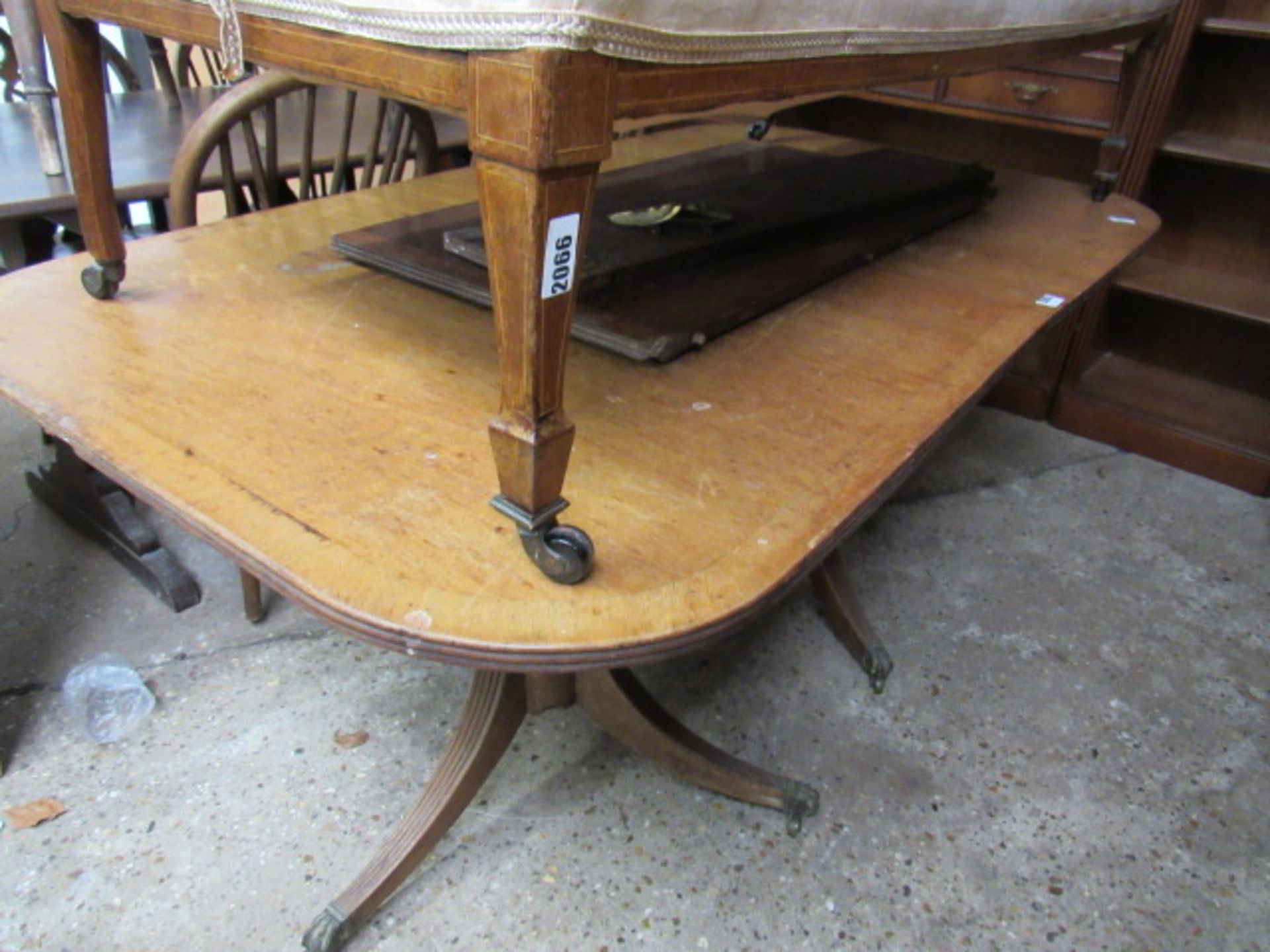 Twin pedestal dining table on castors