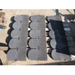 Pallet containing large quantity of overlapping tile effect roofing felt