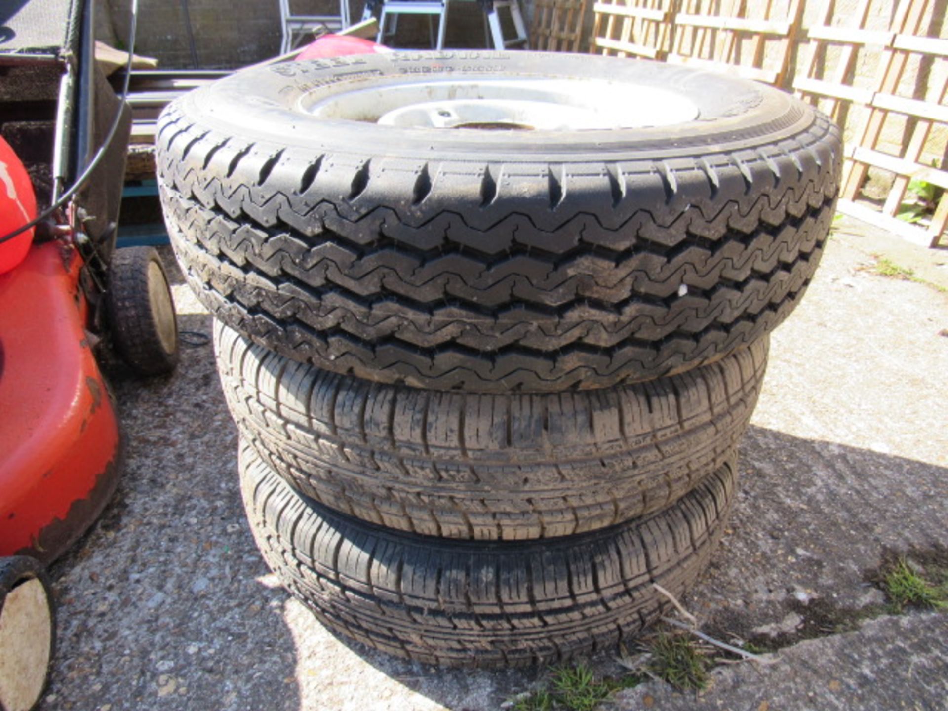 Large yellow linbin of Ford Mondeo lights, and 3 trailer wheel and tyres: 175R13C; 155R13C; 155R13C