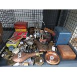Cage containing padlocks, whistles, powder flasks, nutcracker, bottle openers, badges and various