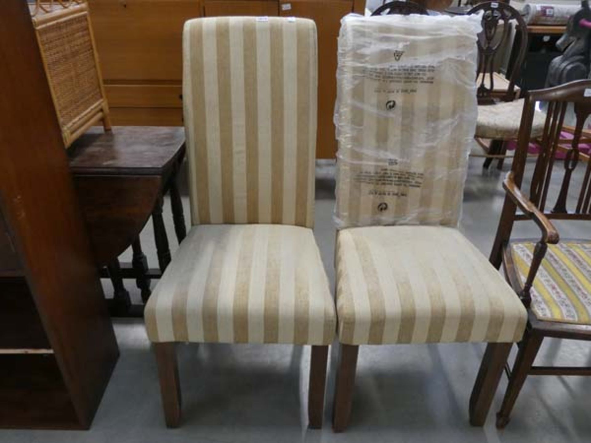 Pair of gold striped dining chairs