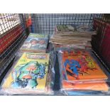 Cage containing a quantity of vintage comics to incl. Judge Dredd, Marvelman, and Thrilling Wonder