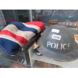 Union Jack, policeman's truncheon and a helmet