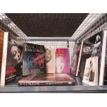 Cage containing a quantity of film reference books