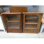 5016 - A pair of glass fronted cabinets, with drawers under