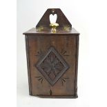 An 18th century and later oak candle box with brass fittings,h.
