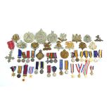 A group of thirty-two First World War, Second World War and later miniature medals