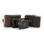 A First World War era 'Vest Pocket' Autographic Kodak camera in a leather case,