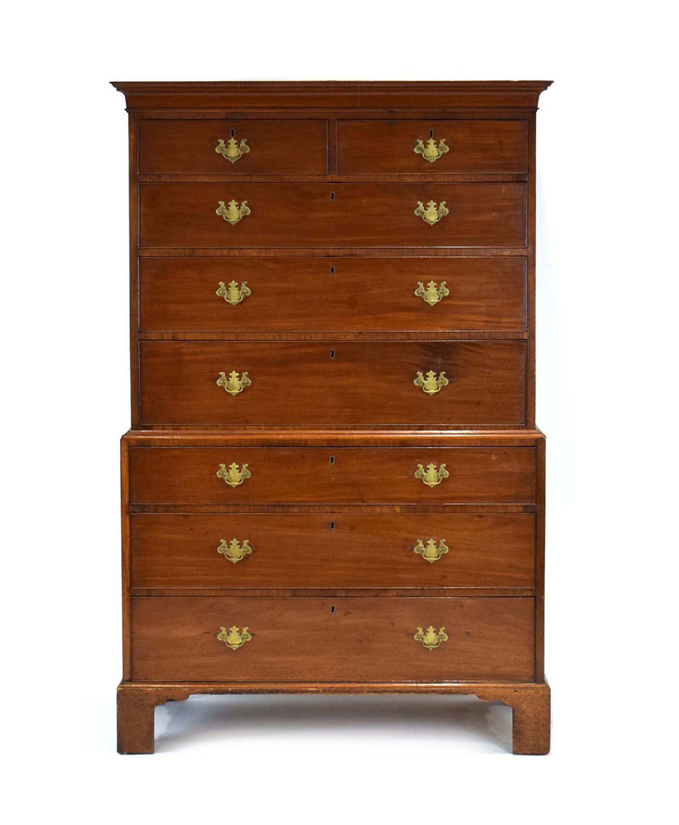 An early 19th century and later mahogany chest-on-chest,