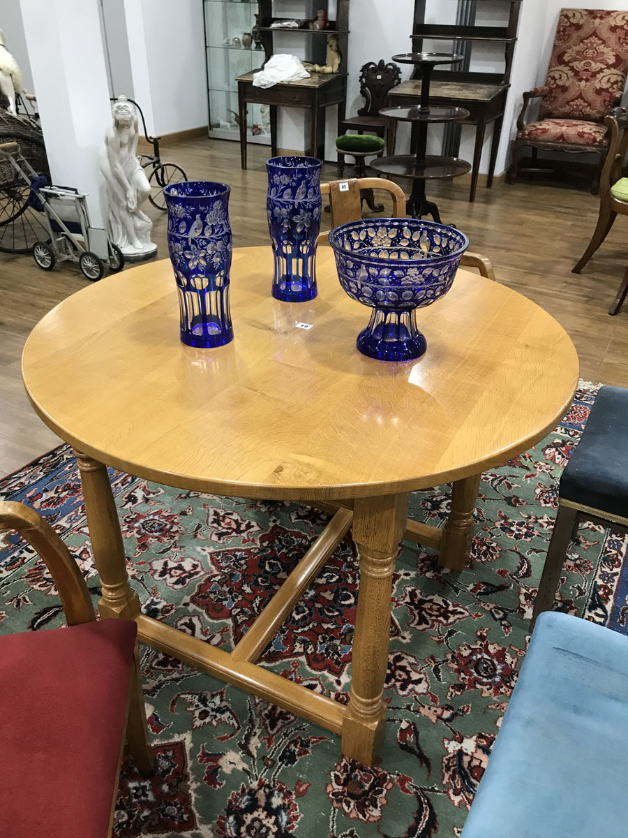 A late 20th century golden oak centre table, the circular surface on four turned supports, - Image 3 of 7