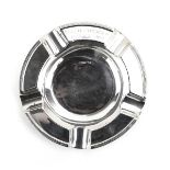 An early 20th century silver ashtray of circular form, Walker & Hall, Sheffield 1919, d.