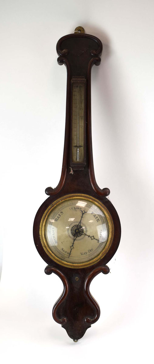 A Victorian mahogany banjo barometer with a silvered back and dial, h.