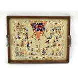 A Second World War Victory embroidery contained within a 1950's glazed tea tray