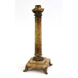 A late 19th/early 20th century alabaster and gilt metal mounted table lamp on scrolled foliate legs,