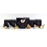 A collection of seven Royal Crown Derby paperweights modelled as a wrens, chaffinches, bluebirds,