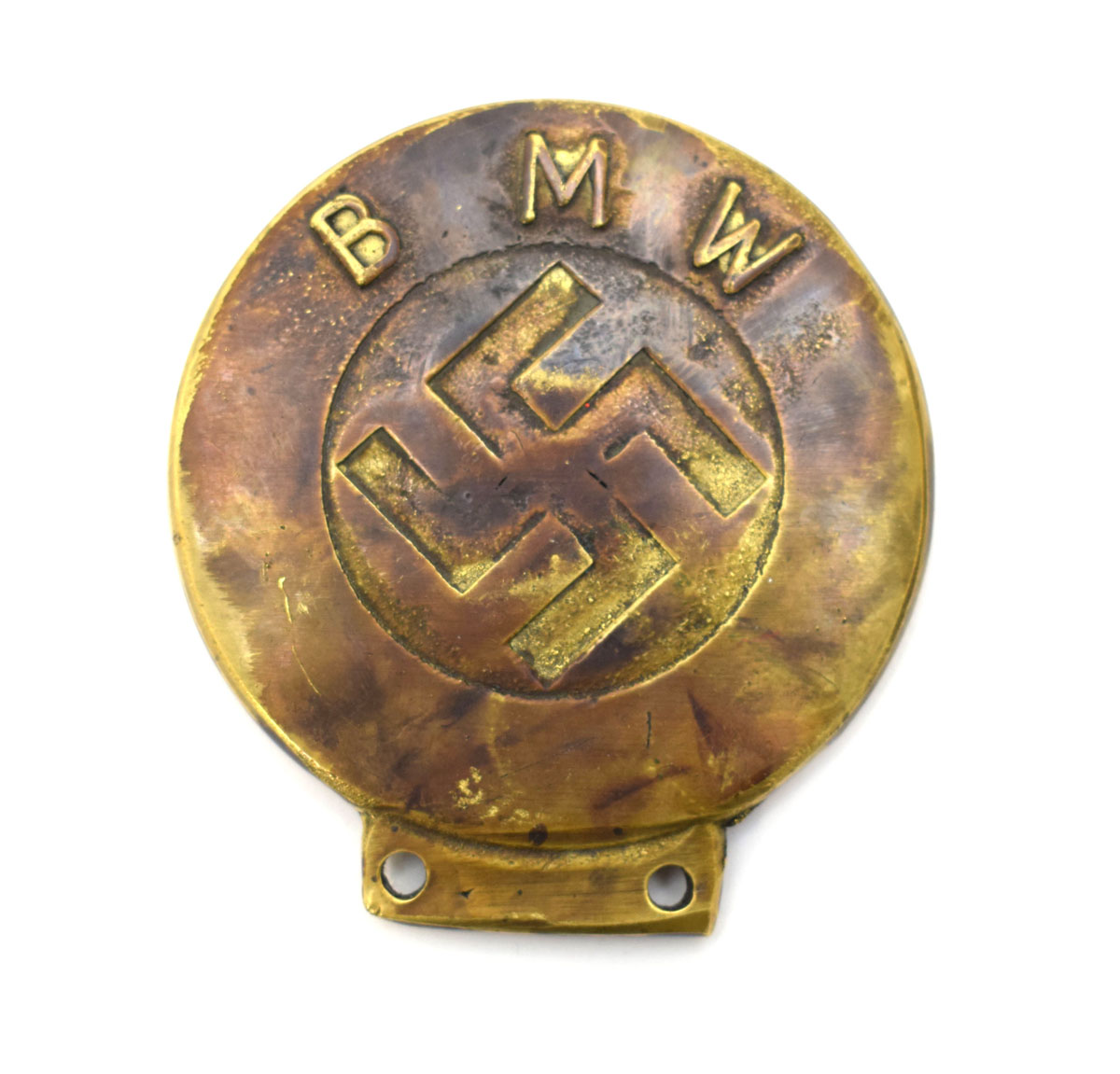 A Second World War-pattern BMW brass car badge