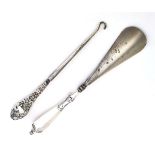 An early 20th century silver handled button hook and shoe horn,