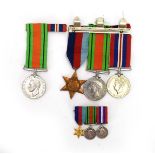 A Second World War trio of medals including The 1939-1945 Star, War and Defence medals,
