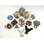 A group of car badges including AA, Pegasus Motor Club, RAC etc.