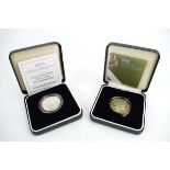 Two Royal Mint silver proof £2 coins: DNA double helix and Second World War,