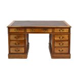 An early 20th century mahogany desk,