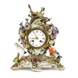 A Meissen figural clock, the movement striking on a bell and inscribed J.D.