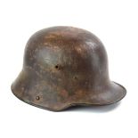 A Second World War German helmet CONDITION REPORT: Please see the additional images