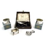A mixed parcel of silver comprising two napkin rings, a salt and a Christening spoon and pusher,